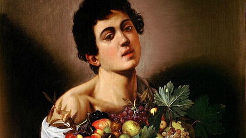 Ein Junge mit einem Obstkorb