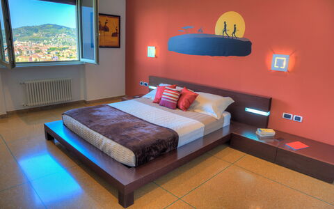 Villa Il Poggiolo Apartments - Diano Marina: Schlafzimmer, Möbel, Bett, Zimmer, Interior Design, Eigentum, Bettrahmen, Bettdecke, Fussboden, Wand