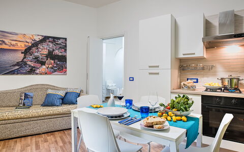 Loving Times Apartment: Tabelle, Eigentum, Möbel, Essen, Azurblau, Geschirr, Couch, Interior Design, Holz, Wohnzimmer