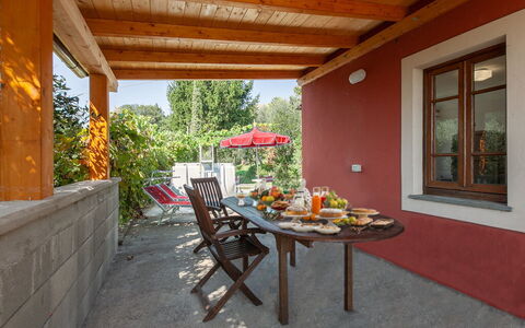 Casa Iris - Versilia, Holiday Home with Pool: Möbel, Eigentum, Tabelle, Gebäude, Pflanze, Stuhl, Holz, Schatten, Interior Design, Fenster