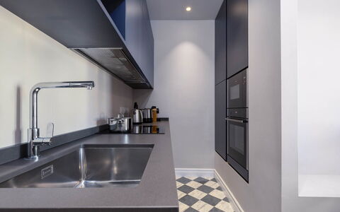 Torretta Penthouse Luxury Apartment In Florence By: Küche, Countertop, Küchengerät, Interior Design, Major Appliance, Cabinetry, Herd, Flooring, Sinken, Haushaltsgerät