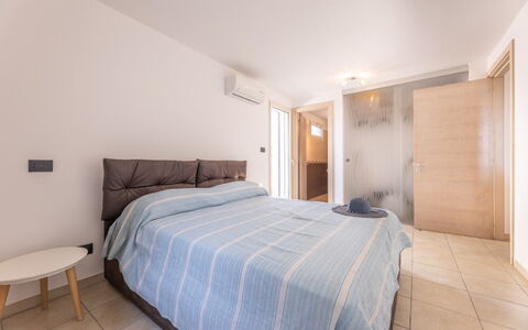 Loft San Giovanni in Gallipoli: Bett, Interior Design, Schlafzimmer, Fussboden, Flooring, Möbel, Bettdecke, Bedding, Holz, Zimmer