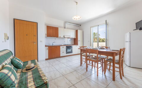 Apartment Balcony Sea View - Gallipoli: Tabelle, Möbel, Cabinetry, Couch, Fenster, Holz, Stuhl, Interior Design, Flooring, Fussboden