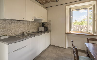 Arpusè - Ca Fredo Apartment with Pool: Flooring, Holz, Küche, Interior Design, Fussboden, Countertop, Decke, Major Appliance, Küchengerät, Spüle