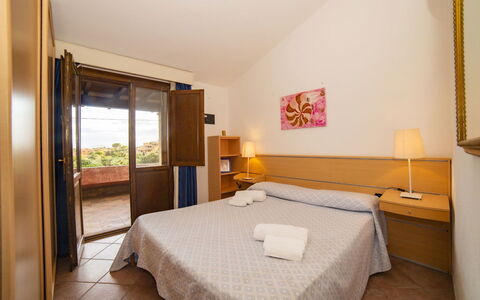 Villetta Seaside Sardegna: Zuhause, Wohnung, Eco Hotel, Hotel, Resort, Villa, Balkon