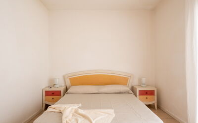 Appartamento Gabbiano: Möbel, Schlafzimmer, Bett, Holz, Bettdecke, Interior Design, Fussboden, Bedding, Flooring, Zimmer