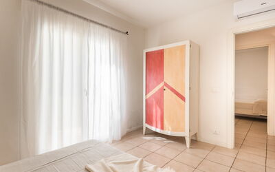 Appartamento Cormorano: Interior Design, Fussboden, Möbel, Flooring, Holz, Schlafzimmer, Decke, Textil, Zimmer, Bett