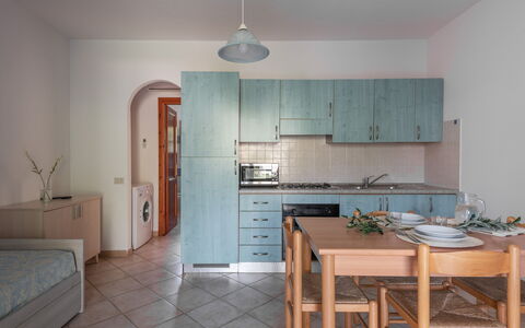 Budoni Homes Seaside, Ac And Bike: Flooring, Interior Design, Fussboden, Möbel, Zimmer, Wohnung, Countertop, Decke, Küche, Küche & Esszimmer Tisch