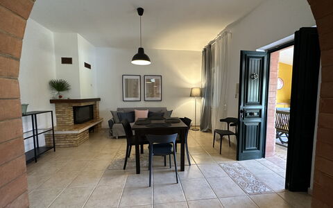 Villa Azzurra: Möbel, Flooring, Fussboden, Interior Design, Stuhl, Beleuchtung, Decke, Tabelle, Zimmer, Wohnzimmer