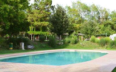 Appartamento Bellosguardo, Wifi, Near Perugia: Schwimmbad, Baum, Resort, Schatten, Garten, Gartenmöbel, Freizeit, Hinterhof, Landscaping, Water Feature