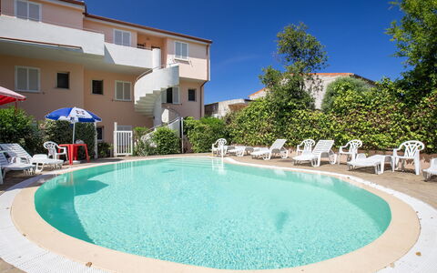 Badesi 10: Schwimmbad, Resort, Gartenmöbel, Hotel, Regenschirm, Ferienort, Sonnenliege, Villa, Boutique Hotel