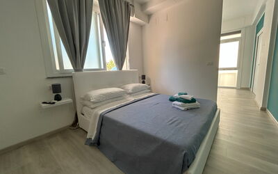 Appartamento Nerea: Interior Design, Fussboden, Flooring, Möbel, Schlafzimmer, Bett, Zimmer, Wohnung, Bettdecke, Decke