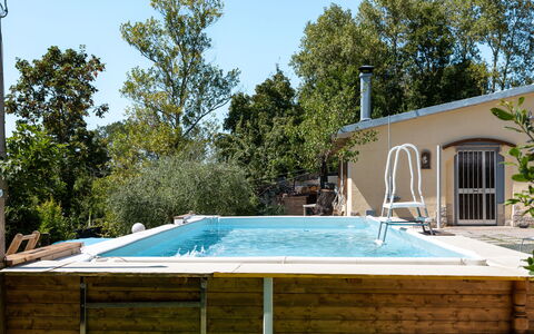 La Pineta Holiday Homes: Schwimmbad, Verbundwerkstoff, Freizeit, Gartenmöbel, Resort, Schatten, Hinterhof, Eco Hotel, Water Feature