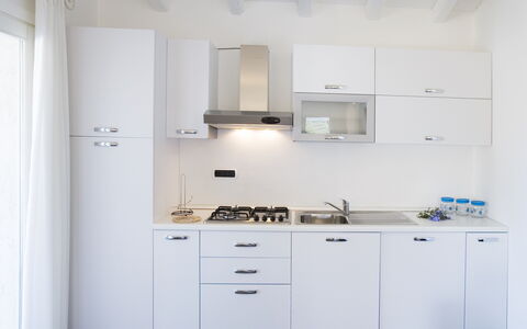 Villa Leccio 2: Küche, Major Appliance, Küchengerät, Countertop, Cabinetry, Interior Design, Herd, Haushaltsgerät, Spüle, Flooring