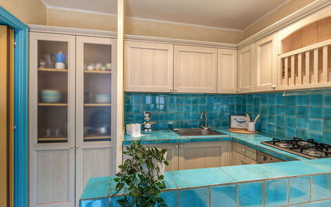 Suite la Torre: Küche, Countertop, Interior Design, Küchengerät, Cabinetry, Flooring, Major Appliance, Holz, Fussboden, Zimmer
