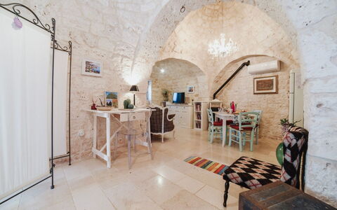 Trulli al Verde Viburno: Interior Design, Möbel, Flooring, Decke, Fussboden, Stuhl, Zimmer, Light Fixture, Wohnung, Wohnzimmer