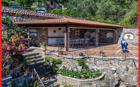 Villa Pietraluna: Steinwand, Garten, Cobblestone, Flagstone, Schatten, Landscaping, Outdoor Struktur, Hazienda, Eco Hotel, Blumentopf