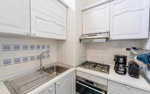 Casa Oscar: Küche, Küchengerät, Major Appliance, Countertop, Herd, Cabinetry, Flooring, Haushaltsgerät, Herd, Interior Design