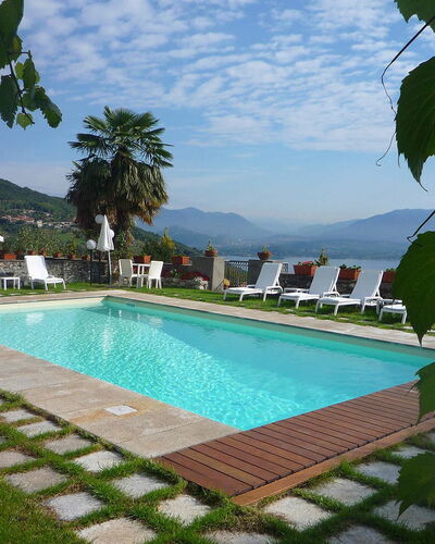 Mariuccia 3: Schwimmbad, Resort, Gartenmöbel, Eco Hotel, Regenschirm, Freizeit, Gebirge, Hazienda, Ferienort, Schatten