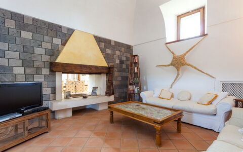 Villa Polluce: Flooring, Fussboden, Interior Design, Möbel, Decke, Zimmer, Fliese, Wohnzimmer, Natürliches Material, Steinwand