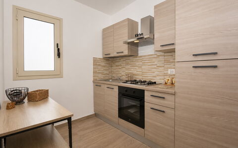 Villa Cosentini: Major Appliance, Holz, Küche, Countertop, Küchengerät, Interior Design, Flooring, Cabinetry, Wohnung, Fussboden
