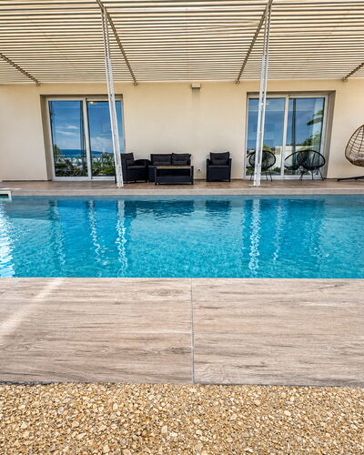 A Casa di Chica: Wasser, Schwimmbad, Verbundwerkstoff, Resort, Gartenmöbel, Schatten, Freizeit, Water Feature, Stuhl, Sonnenliege