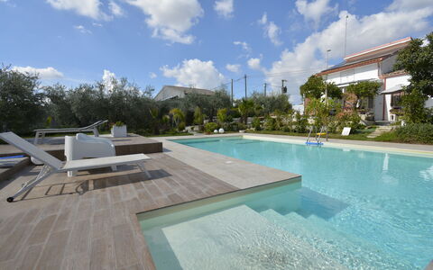 La Dimora di Artemide: Schwimmbad, Resort, Verbundwerkstoff, Garten, Landscaping, Water Feature, Schatten, Eco Hotel, Hinterhof, Freizeit