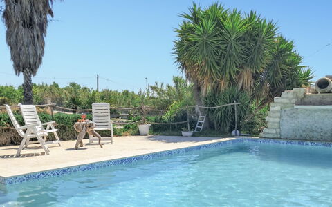 Villa Emme: Himmel, Schwimmbad, Resort, Freizeit, Eco Hotel, Hazienda, Gartenmöbel, Landscaping, Urlaub