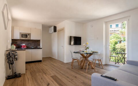Next Comacina, Lago di Como with Garage: Möbel, Flooring, Wohnung, Stuhl, Holzboden, Hartholz, Zimmerpflanze, Holzbeize, Wohnzimmer, Balkon