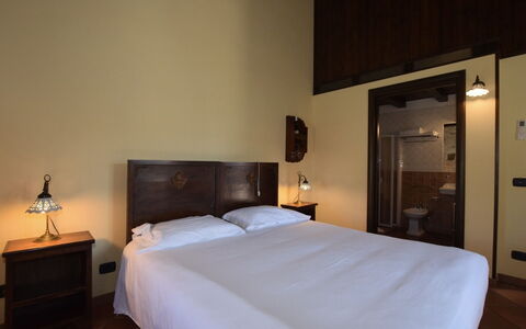 La Muraglia: Wand, Interior Design, Holz, Fussboden, Flooring, Bett, Schlafzimmer, Decke, Möbel, Beleuchtung