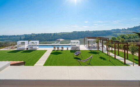 Villa Oxa 12+2: Schwimmbad, Gartenmöbel, Garten, Kunstrasen, Rasen, Landscaping, Resort, Park, Balkon, Villa