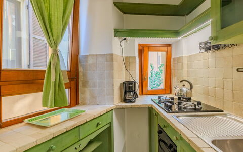 La Finestra sul Lago: Interior Design, Küche, Holz, Decke, Flooring, Countertop, Major Appliance, Zimmer, Fussboden, Küchengerät