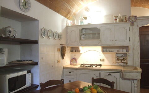 Appartamento Le Volte: Zimmer, Eigentum, Küche, Möbel, Countertop, Cabinetry, Interior Design, Herd, Haus, Gebäude